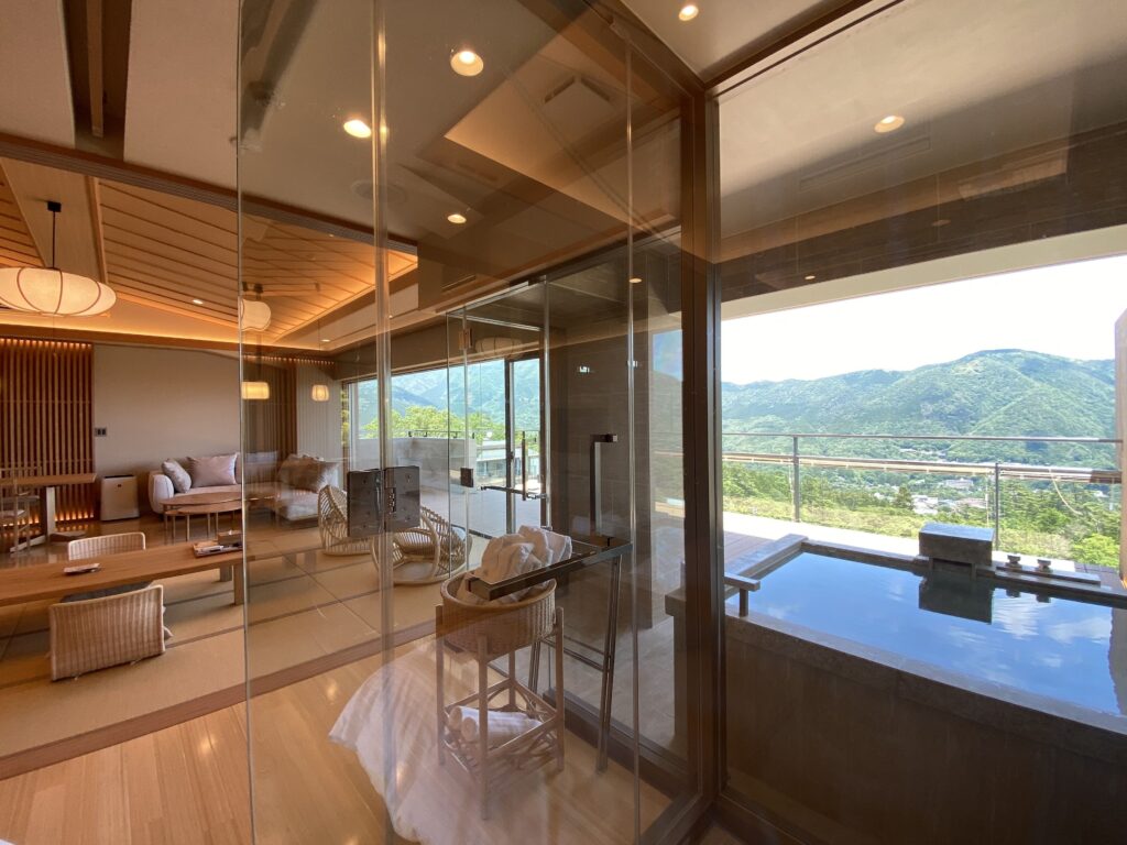 Private outdoor onsen bath with mountain views at Gen Hakone
