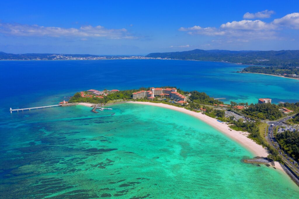 Aerial view of Cape Busena peninsula and beach at The Busena Terrace Okinawa