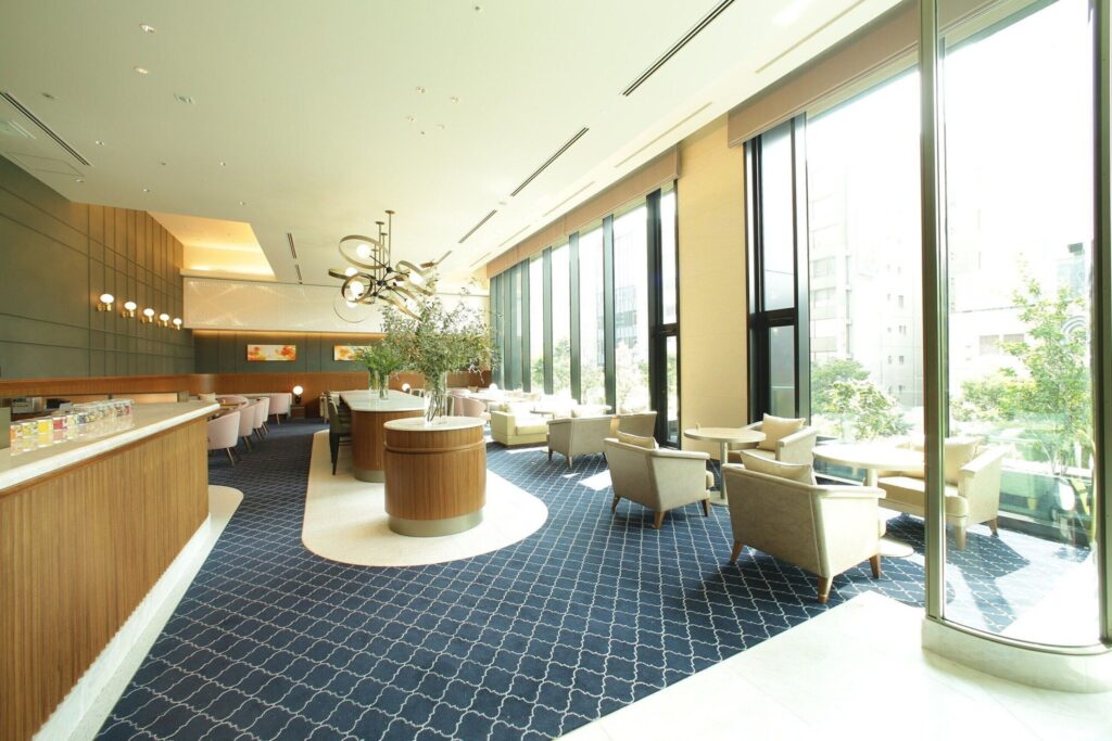 Lounge interior with tall windows at Miyako Hotel Hakata