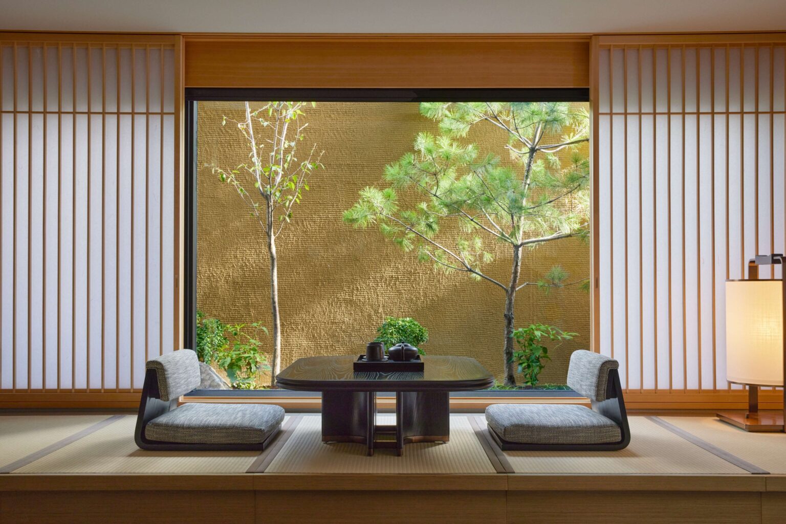 Tatami seating and courtyard view at Dusit Thani Kyoto