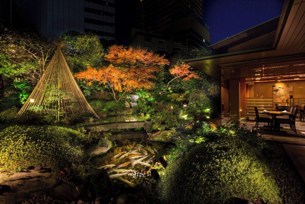 Illuminated Japanese garden beside Unkai at ANA InterContinental Tokyo