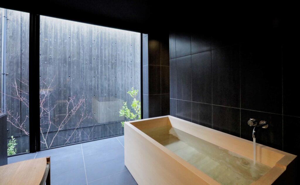 Sowaka guest room bath facing a private courtyard
