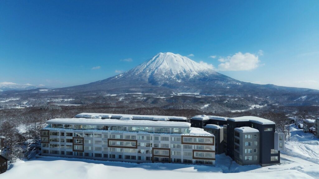 Setsu Niseko hotel beneath snow-covered Mount Yotei in winter
