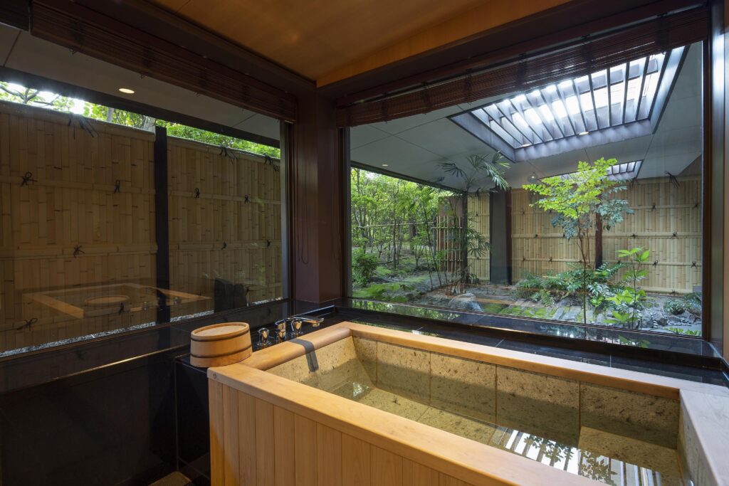 Japanese Suite soaking tub overlooking a private garden at Grand Hyatt Fukuoka