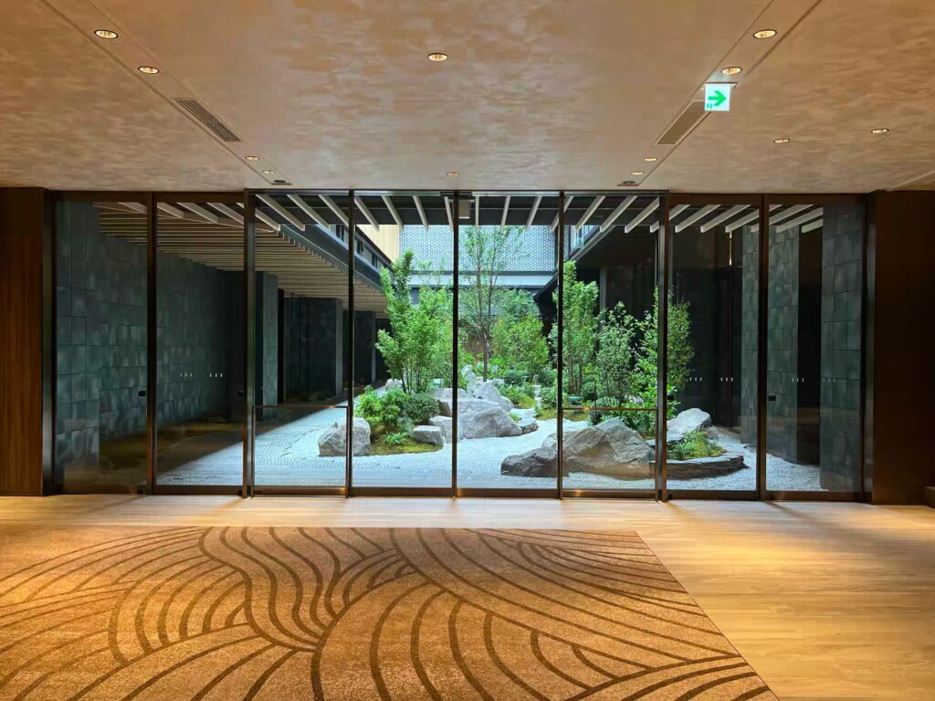 Dusit Thani Kyoto interior facing a courtyard garden