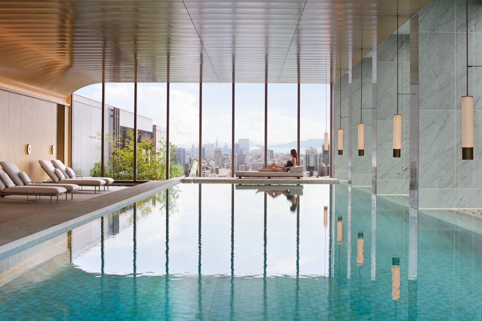 Indoor pool overlooking the Fukuoka skyline at The Ritz-Carlton Fukuoka