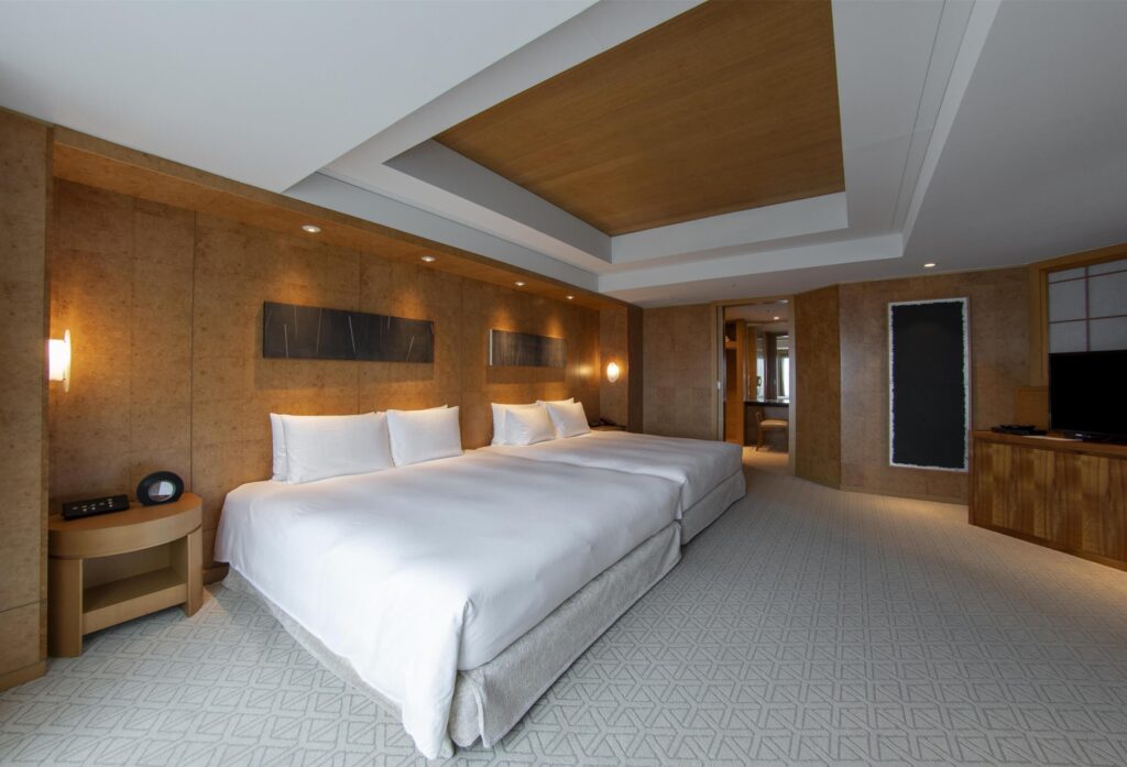 Twin guest room with two beds at Grand Hyatt Fukuoka