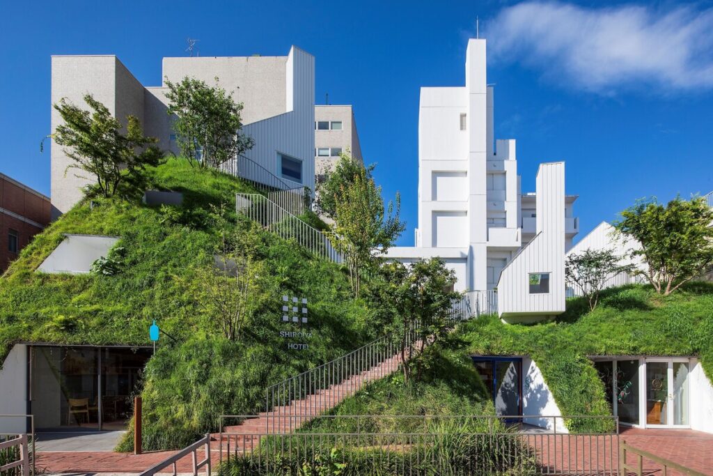 Green Tower at SHIROIYA HOTEL covered in landscaped greenery