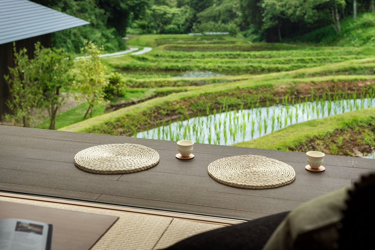 Tea set overlooking newly planted rice terraces at KAI Yufuin