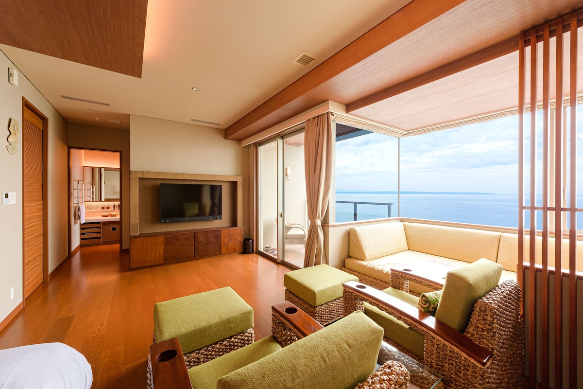 Spacious ocean-facing living room at AMANE RESORT SEIKAI