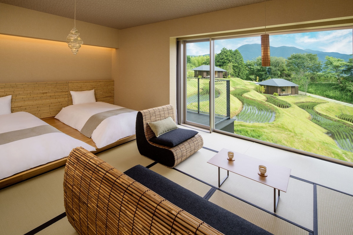 Japanese-style guest room overlooking the rice terraces at Hoshino Resorts KAI Yufuin