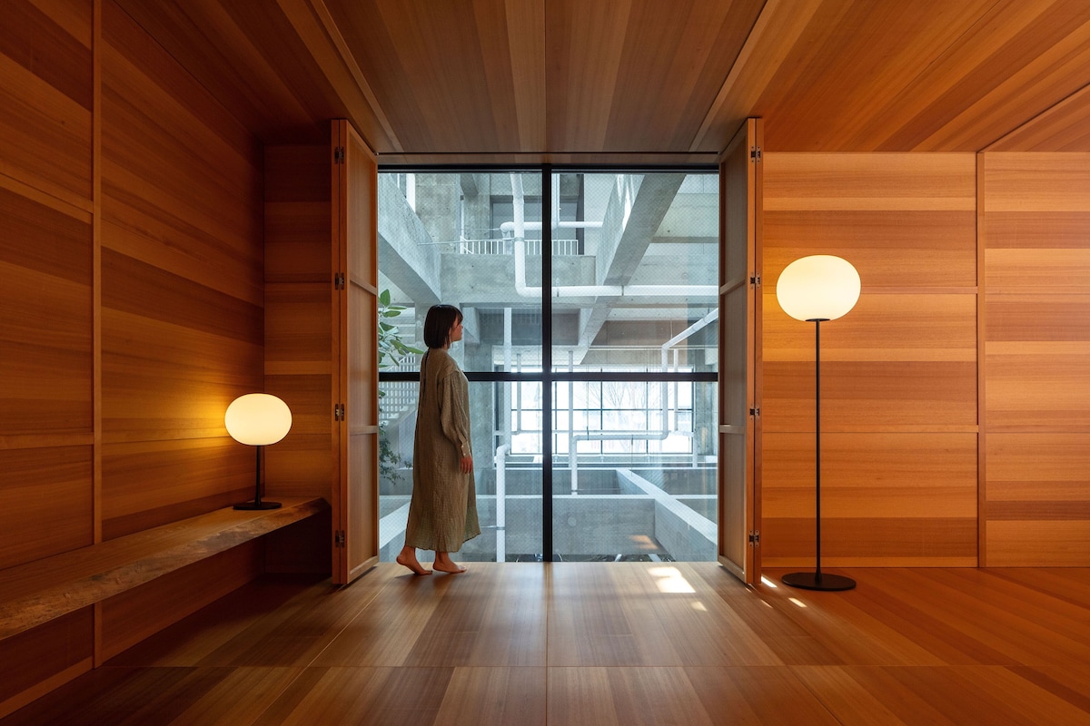 Wood-lined Jasper Morrison concept room at SHIROIYA HOTEL