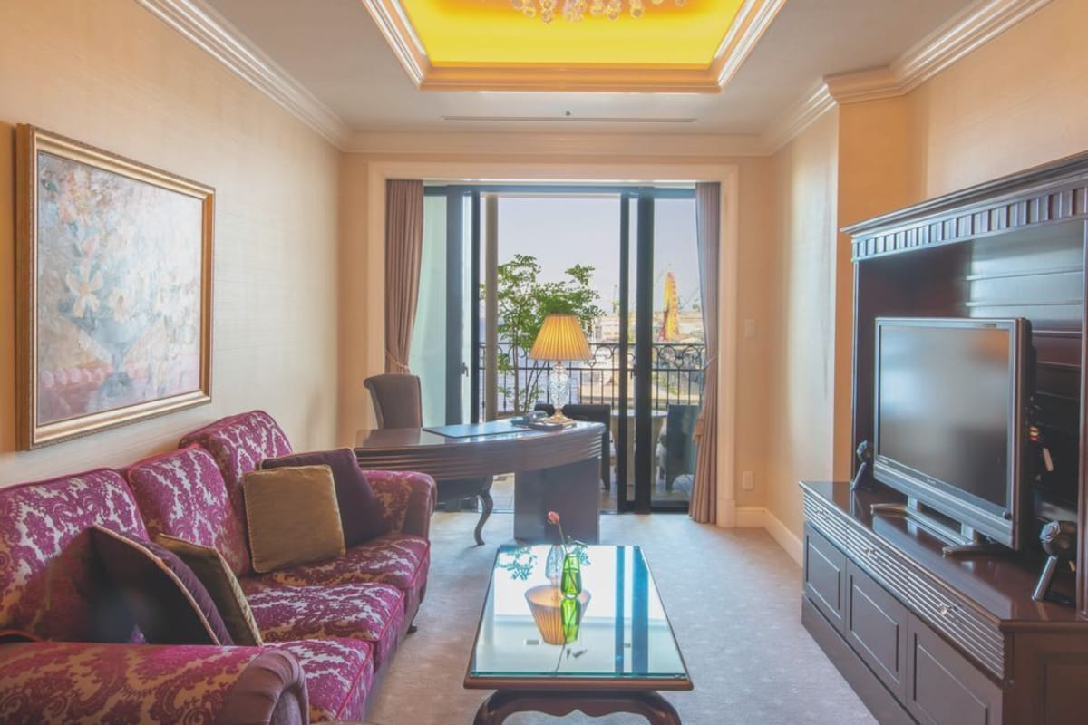 Suite living room opening toward the harbour at Hotel La Suite Kobe Harborland