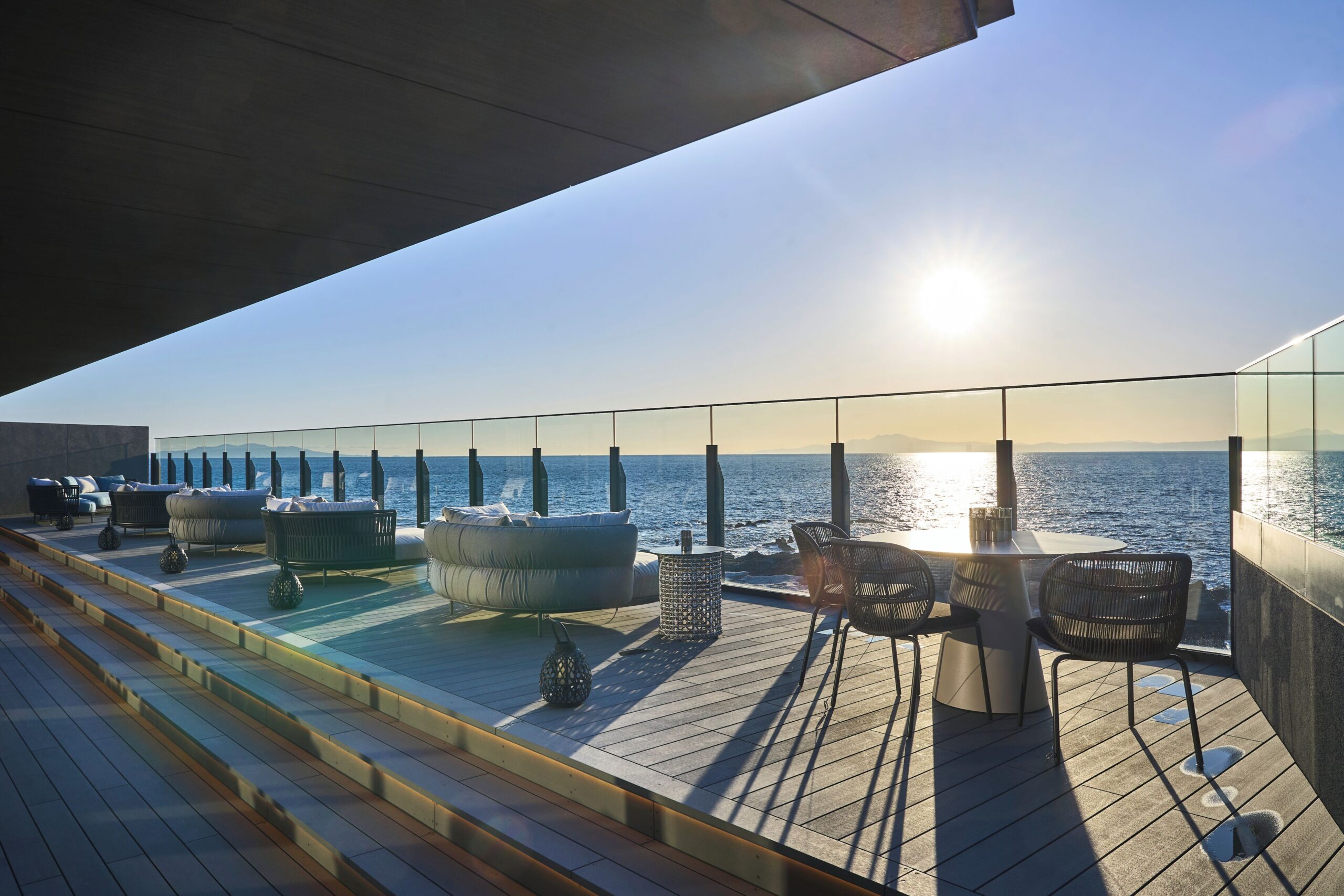 Lounge seating on the sea-facing rooftop terrace at FUFU Jogashima.