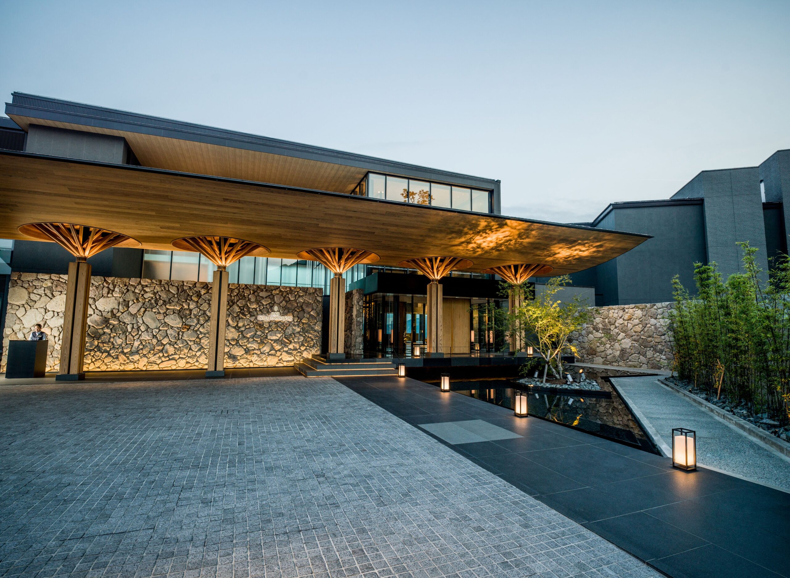 Stone-and-timber entrance of ANA InterContinental Beppu Resort & Spa