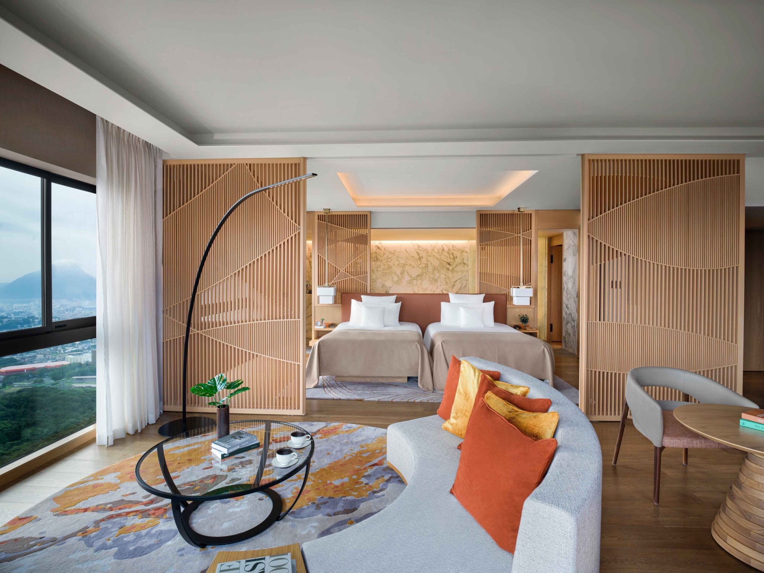 Spacious suite at ANA InterContinental Beppu with dining area and panoramic views