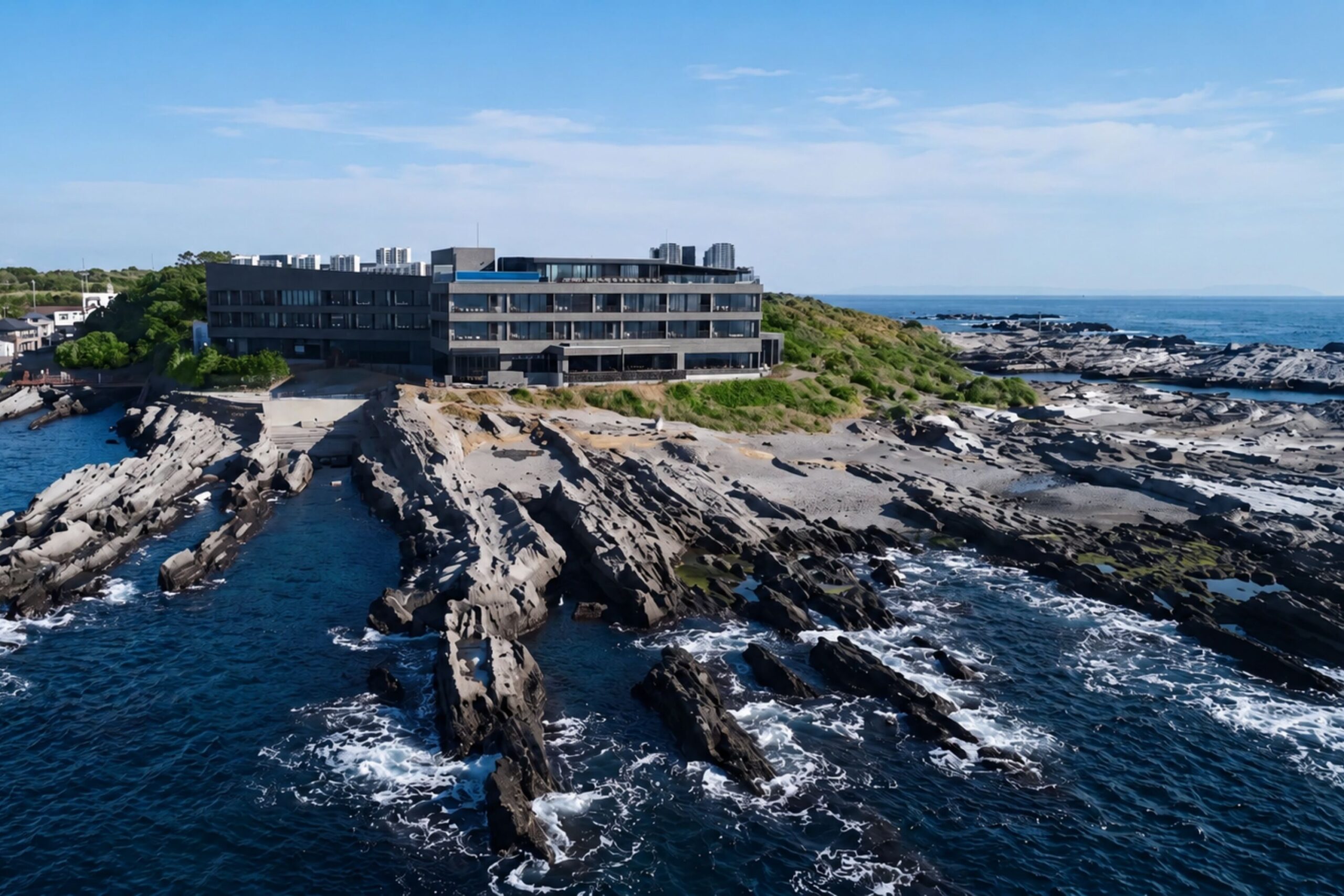 FUFU Jogashima beside the island's rocky coastline.