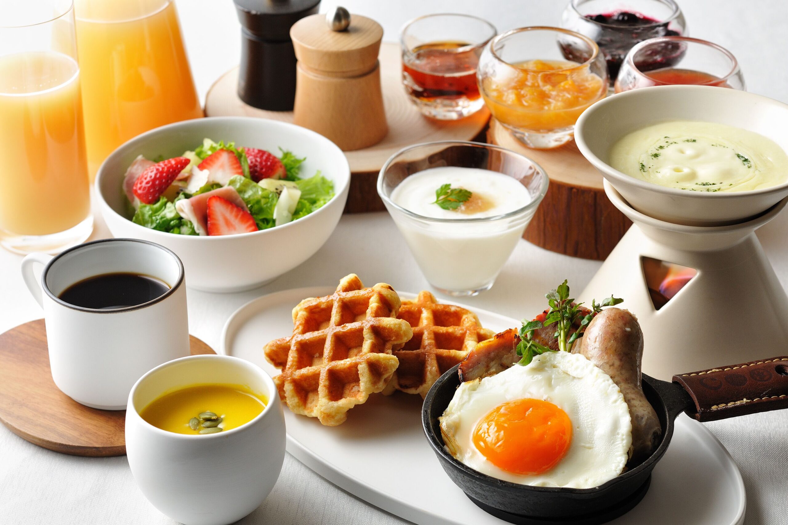 Full breakfast with eggs, waffles, fruit, yoghurt and warm dishes at HOSHINOYA Fuji