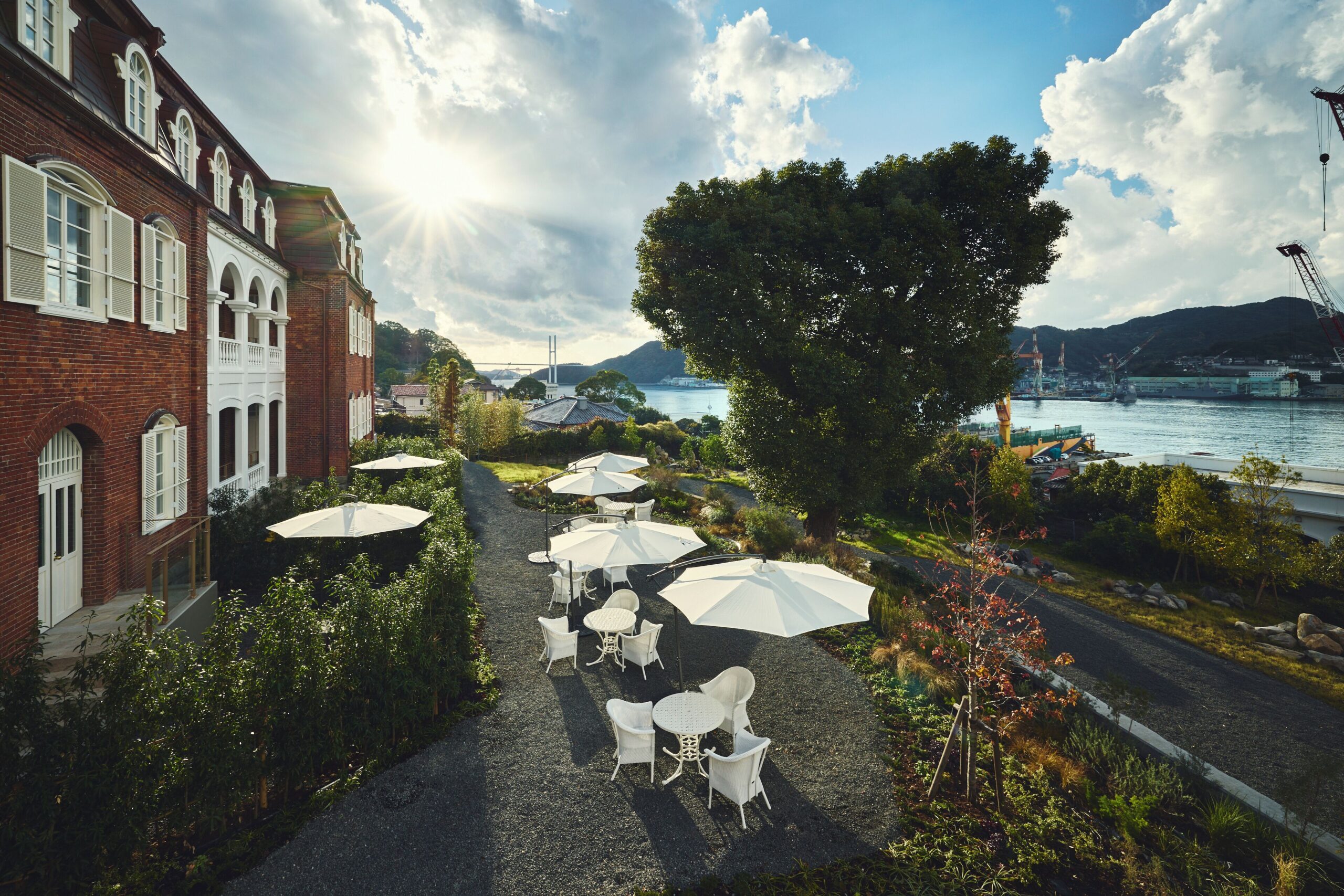 Garden terrace beside the redbrick heritage buildings at Hotel Indigo Nagasaki