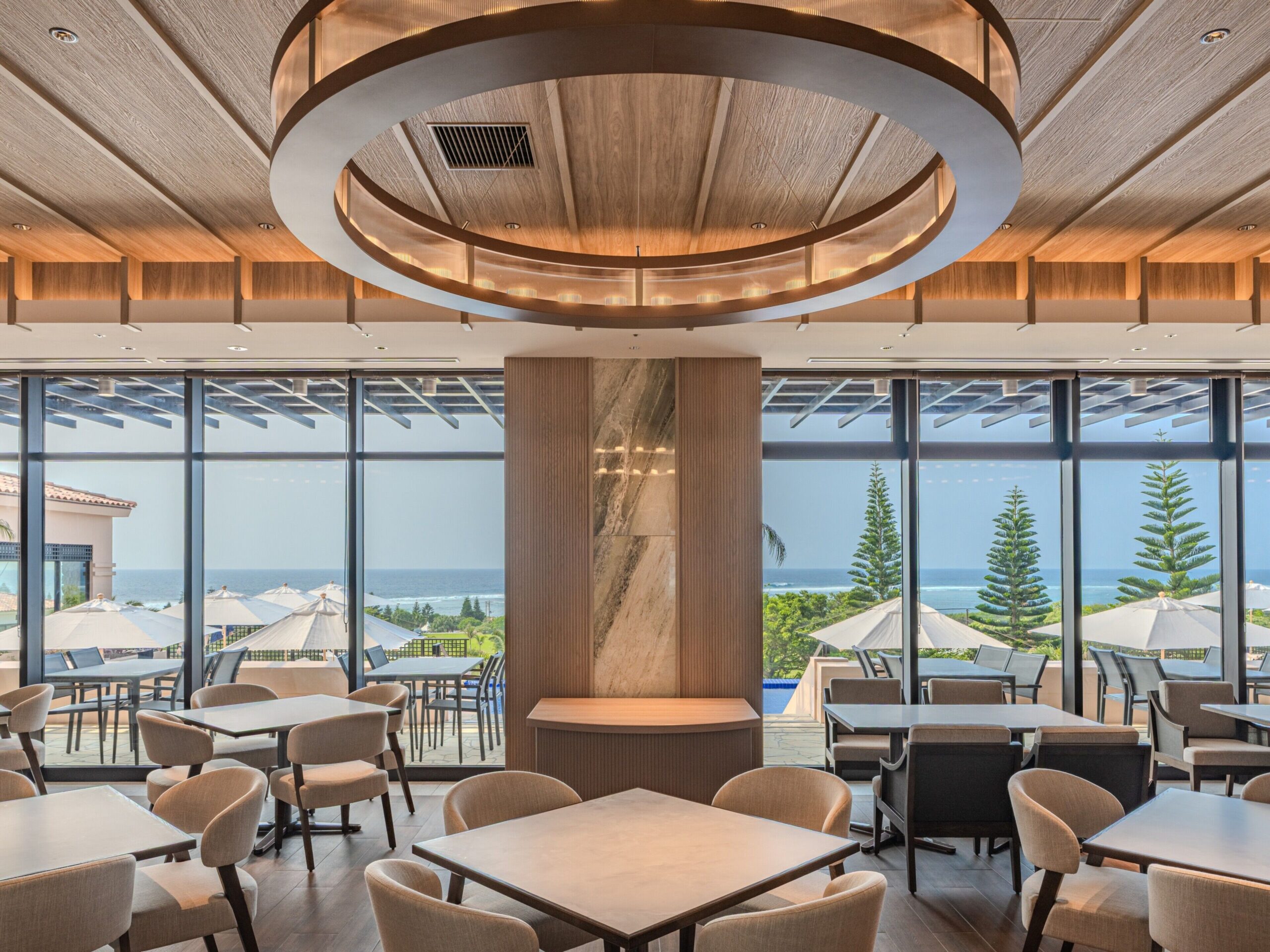 With Blue restaurant at ALLAMANDA Splendid, with large windows and circular ceiling lights
